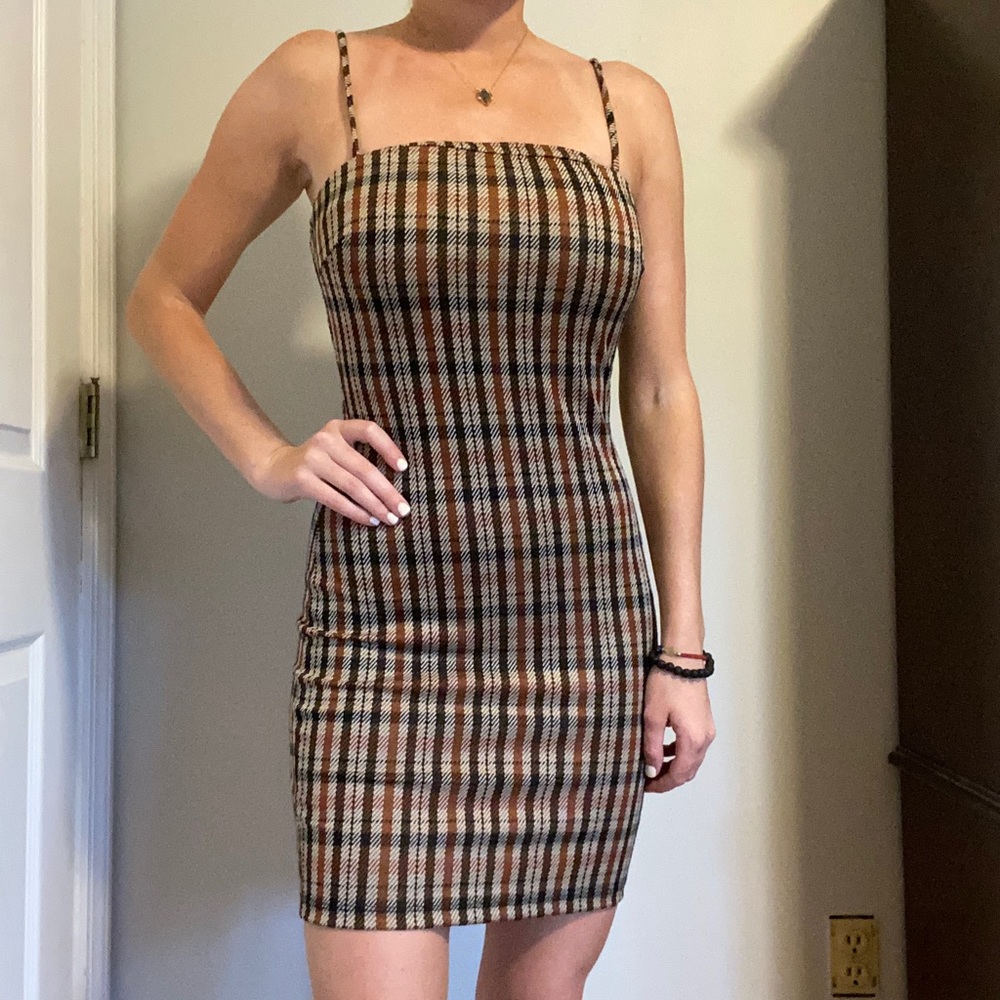A different shade of brown plaid dress